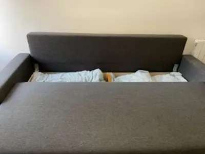 Un ou plusieurs lits dans un hébergement de l'établissement Appartement 2 chambres Lyonnais