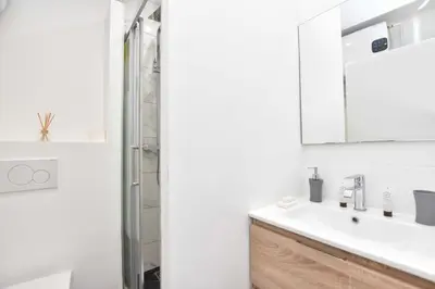Salle de bains dans l'établissement Cozy apartment 1BR 4P - Palais Royal