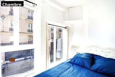 Un ou plusieurs lits dans un hébergement de l'établissement Appartement - Paris