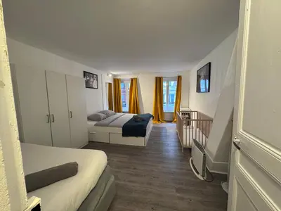 Un ou plusieurs lits dans un hébergement de l'établissement Central Flat for 7