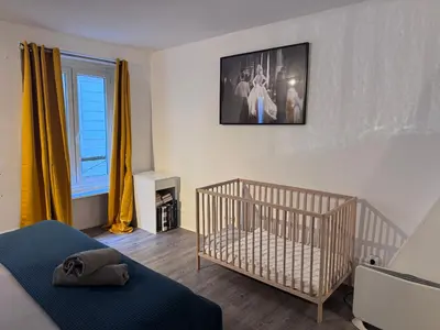 Un ou plusieurs lits dans un hébergement de l'établissement Central Flat for 7