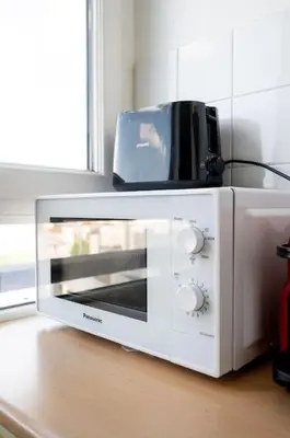 Cuisine ou kitchenette dans l'établissement Studio Paris 14ème arrondissement - II