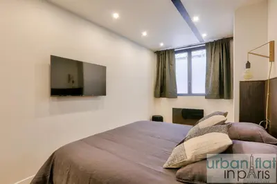 Un ou plusieurs lits dans un hébergement de l'établissement 170 - Sublime Flat in Center of Paris