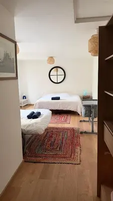 Un ou plusieurs lits dans un hébergement de l'établissement Spacious Private House 160sqm Prime Location with Yard and Parking for 2 Cars