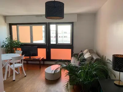 Coin salon dans l'établissement Appartement lumineux 2 pièces Paris – idéal famille