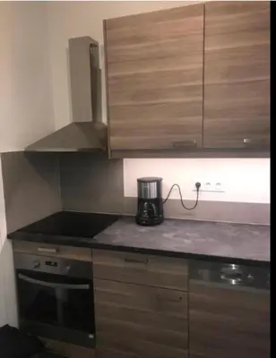 Cuisine ou kitchenette dans l'établissement Pavillon 1 à 4 personnes chez l’habitant parfait pour une famille