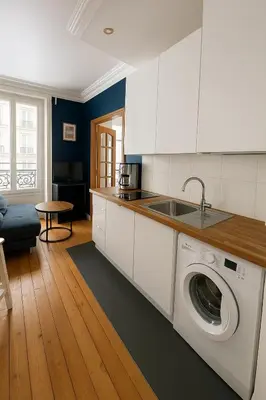 Cuisine ou kitchenette dans l'établissement CHAMPS DE MARS - SUFFREN