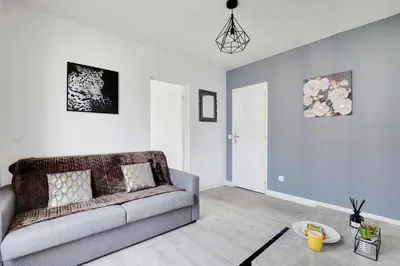 Coin salon dans l'établissement Appartement Suite 43 aux Portes de Paris
