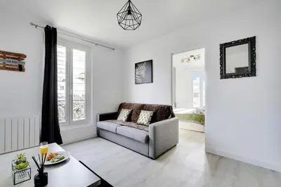Coin salon dans l'établissement Appartement Suite 43 aux Portes de Paris