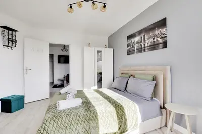 Un ou plusieurs lits dans un hébergement de l'établissement Appartement Suite 43 aux Portes de Paris