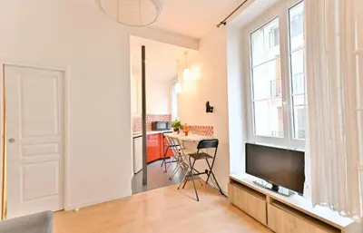Télévision ou salle de divertissement dans l'établissement Appartement au cœur du Marais - III