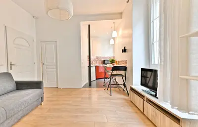 Télévision ou salle de divertissement dans l'établissement Appartement au cœur du Marais - III