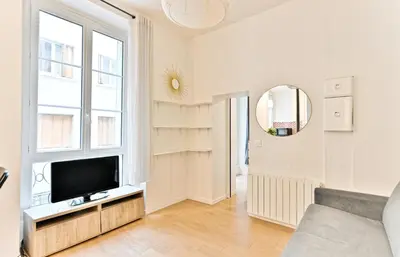 Télévision ou salle de divertissement dans l'établissement Appartement au cœur du Marais - III
