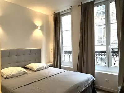 Un ou plusieurs lits dans un hébergement de l'établissement GoodGuest-Cosy Apartment Paris Montorgueil-4 PAX Bail Mobilité