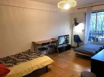 Un ou plusieurs lits dans un hébergement de l'établissement Grand appartement proche métro