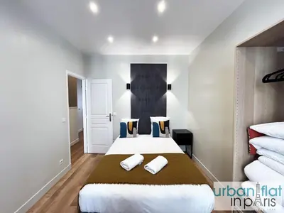Un ou plusieurs lits dans un hébergement de l'établissement 23 - Charming Parisian Flat in Paris