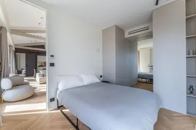 Un ou plusieurs lits dans un hébergement de l'établissement Haussman Palace Appartment