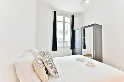 Un ou plusieurs lits dans un hébergement de l'établissement Appartement 2 chambres Pyrénées Alexandre Dumas