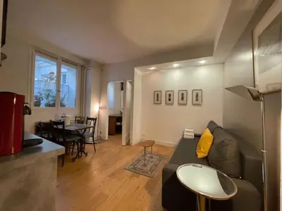 Coin salon dans l'établissement Nice flat in face to Seine River