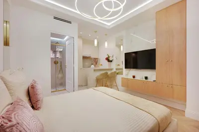 Télévision ou salle de divertissement dans l'établissement Cœur du Marais