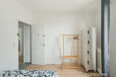 Un ou plusieurs lits dans un hébergement de l'établissement Flexliving - room - Houel