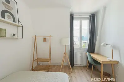 Un ou plusieurs lits dans un hébergement de l'établissement Flexliving - room - Houel