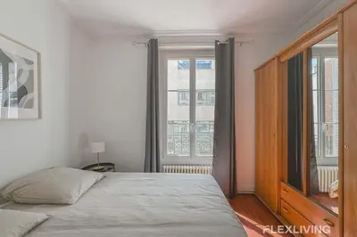 Un ou plusieurs lits dans un hébergement de l'établissement Flexliving - room - Lindet