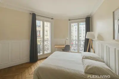Un ou plusieurs lits dans un hébergement de l'établissement Flexliving - Whole Flat - Lamarck
