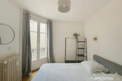 Un ou plusieurs lits dans un hébergement de l'établissement Flexliving - room - Abbé Groult