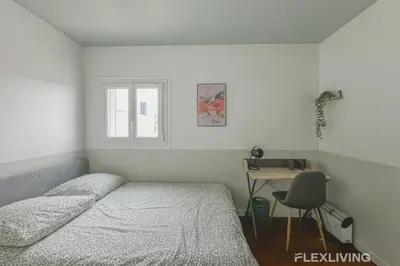 Un ou plusieurs lits dans un hébergement de l'établissement Flexliving - room - Losserand