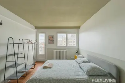 Un ou plusieurs lits dans un hébergement de l'établissement Flexliving - room - Losserand