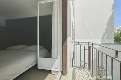 Un ou plusieurs lits dans un hébergement de l'établissement Flexliving - Whole flat - Friant