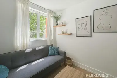 Coin salon dans l'établissement Flexliving - Room - Friant