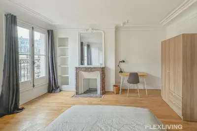 Un ou plusieurs lits dans un hébergement de l'établissement Flexliving - whole flat - Turbigo
