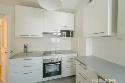 Cuisine ou kitchenette dans l'établissement Flexliving - whole flat - Turbigo