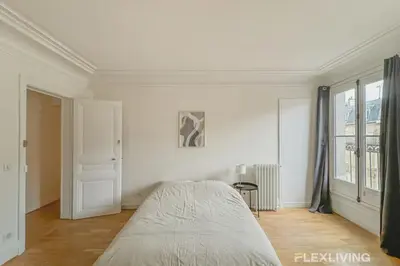 Un ou plusieurs lits dans un hébergement de l'établissement Flexliving - whole flat - Turbigo