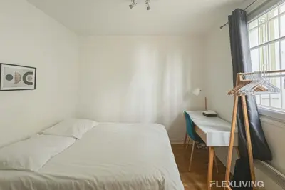 Un ou plusieurs lits dans un hébergement de l'établissement Flexliving - whole flat - Banquier