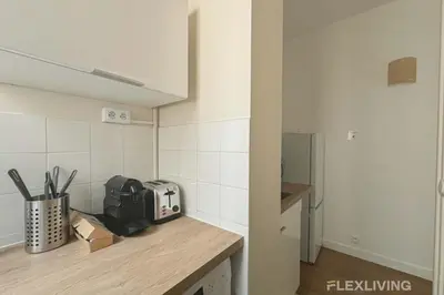 Cuisine ou kitchenette dans l'établissement Flexliving - Room - Mesnil