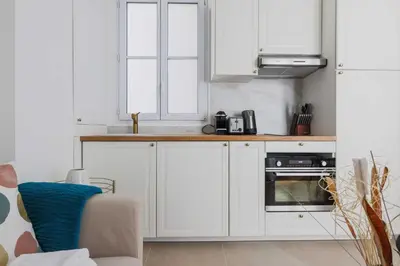 Cuisine ou kitchenette dans l'établissement Cosy and chic apartment -1BD-4P- Auteuil