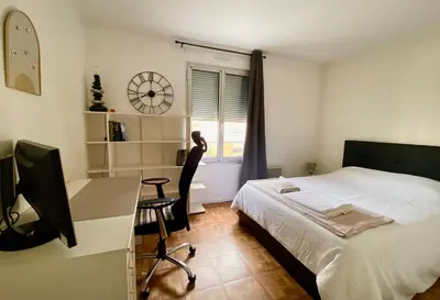 Un ou plusieurs lits dans un hébergement de l'établissement Chambre privée chez l'habitant - Parking Métro - Paris Porte de Versailles