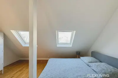 Un ou plusieurs lits dans un hébergement de l'établissement Flexliving - room - Bausset