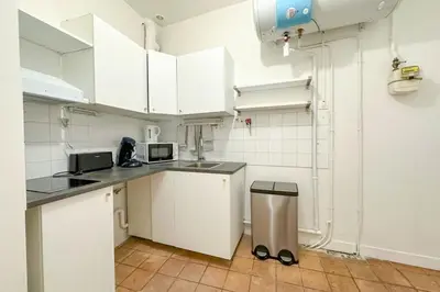 Cuisine ou kitchenette dans l'établissement Flexliving - room - Échiquier