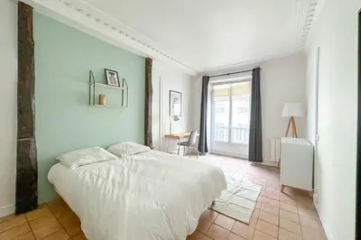 Un ou plusieurs lits dans un hébergement de l'établissement Flexliving - whole flat - Echiquier