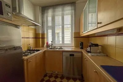 Cuisine ou kitchenette dans l'établissement Flexliving - whole flat - Bachaumont