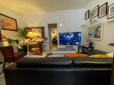 Télévision ou salle de divertissement dans l'établissement Appartement Paris Gare du nord