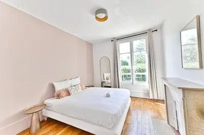 Un ou plusieurs lits dans un hébergement de l'établissement Appartement lumineux - Puteaux - II