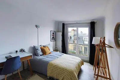 Un ou plusieurs lits dans un hébergement de l'établissement Flexliving - whole flat - Villon