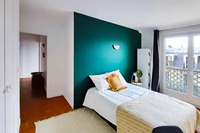 Un ou plusieurs lits dans un hébergement de l'établissement Flexliving - whole flat - Villon