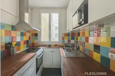 Cuisine ou kitchenette dans l'établissement Chambre Paris 10 - Bail mobilité