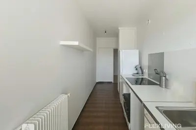 Cuisine ou kitchenette dans l'établissement Flexliving - whole flat - Saint Amand